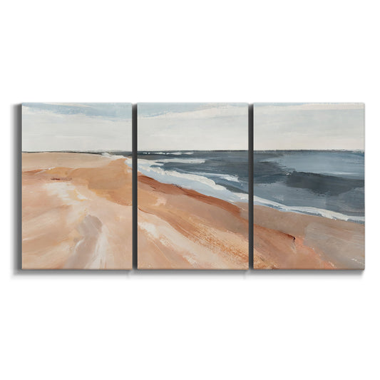 Three-panel canvas wall art featuring abstract coastal beach composition on white background.