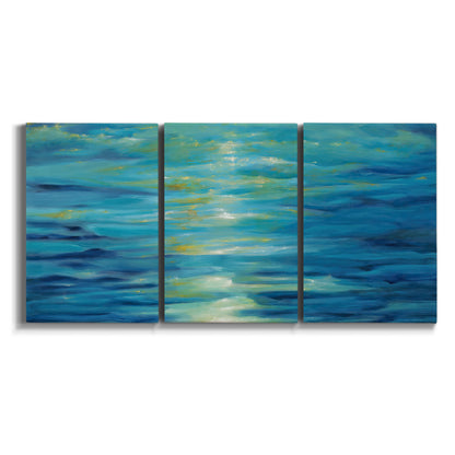 Three-panel canvas wall art featuring deep blue ocean water abstraction on white background.
