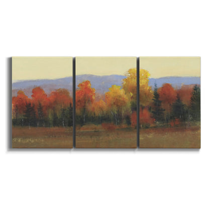 Three-panel canvas wall art featuring autumn landscape changing foliage on white background.