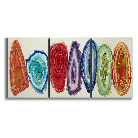 Three-panel canvas wall art featuring polished geode slice abstract pattern on white background.