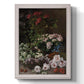 Early impressionist floral painting by Claude Monet printed on canvas in an ornate weathered white frame with a vertical orientation.