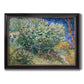 Impressionist lilac flower painting by Vincent van Gogh printed on canvas in an ornate black frame with gilded inner detail.