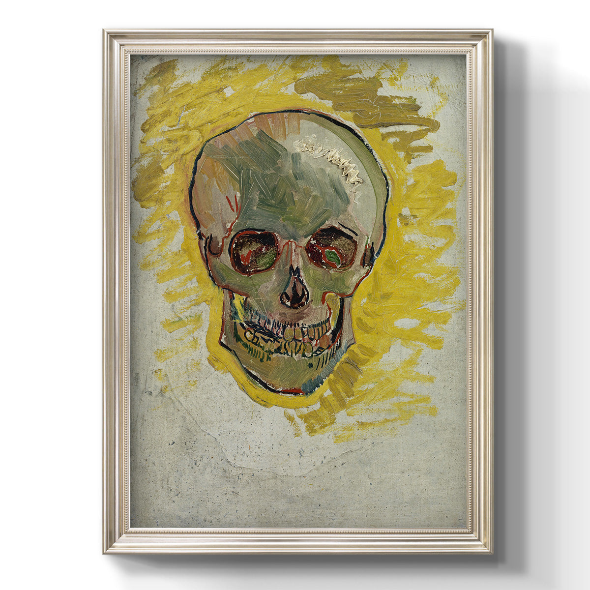 Expressive skull study painting by Vincent van Gogh printed on canvas in an ornate black frame with gilded inner detail with a vertical orientation.