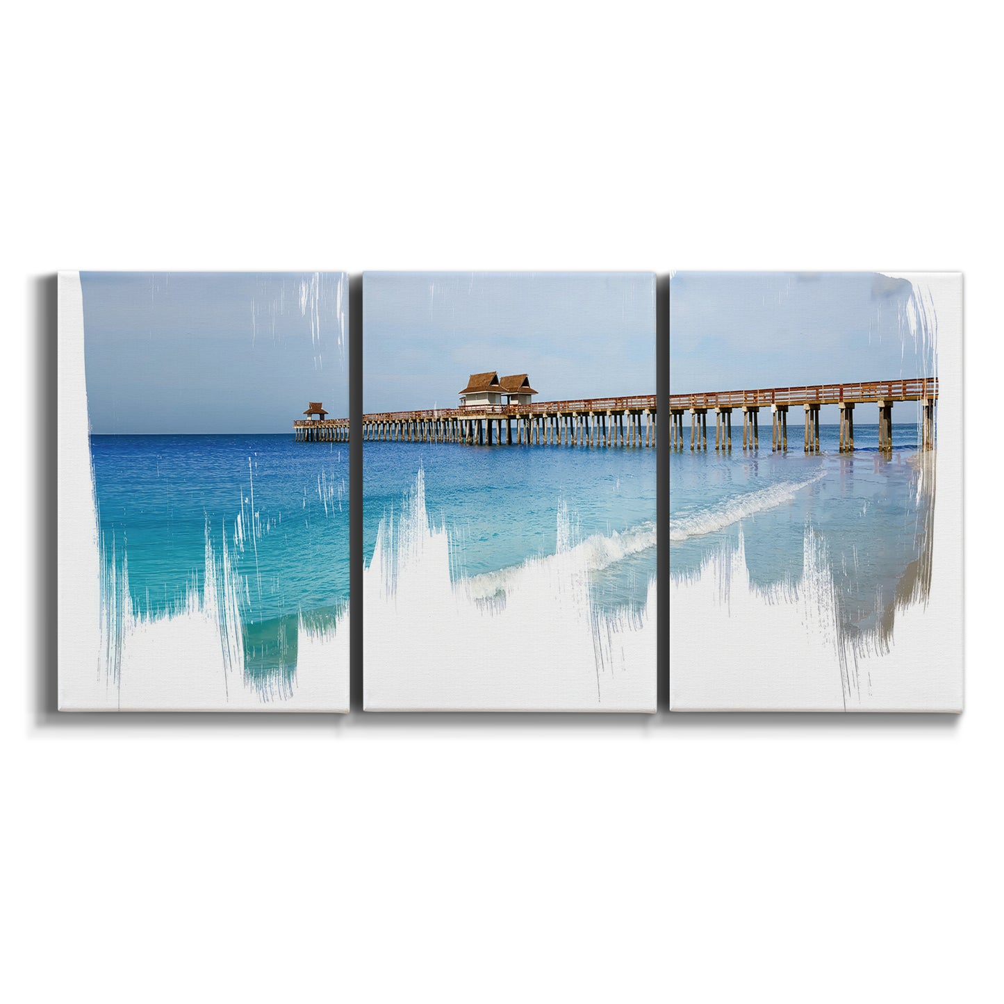 Three-panel canvas wall art featuring coastal pier extending over water on white background.