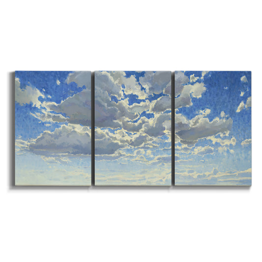 Three-panel canvas wall art featuring whimsical cloud filled sky landscape on white background.