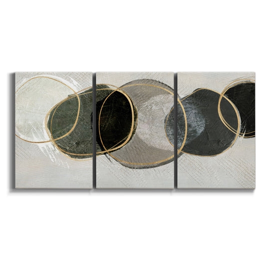 Three-panel canvas wall art featuring smooth abstract river stone forms on white background.