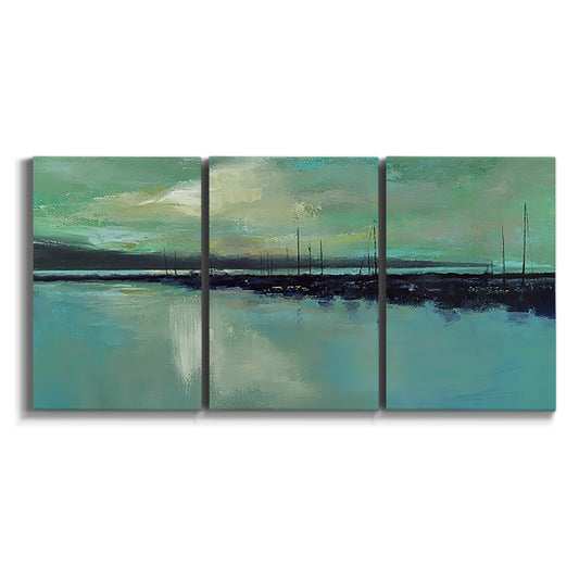 Three-panel canvas wall art featuring calm harbor water with glowing horizon on white background.