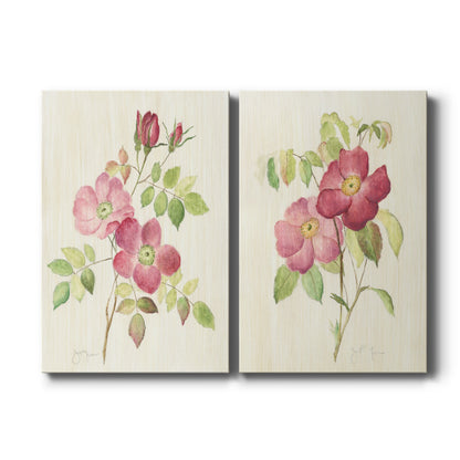 Set of two vertical canvas prints featuring dusty rose pink floral botanical artwork, displayed side by side.