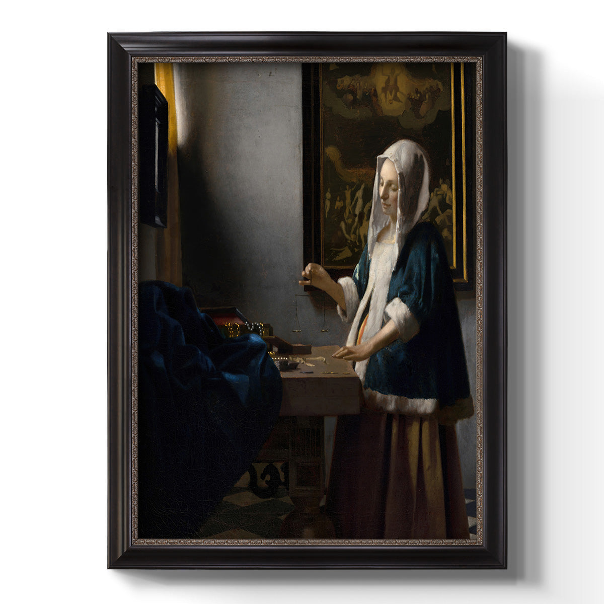 Quiet interior genre scene of a woman with scales by Johannes Vermeer printed on canvas in an ornate black frame with gilded inner detail with a vertical orientation.