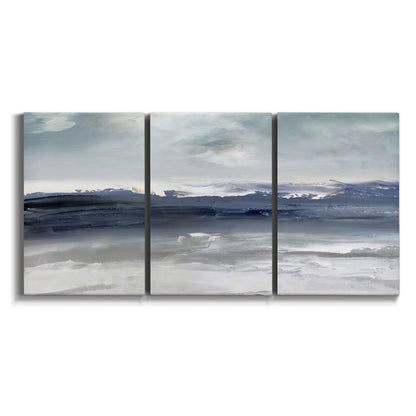 Three-panel canvas wall art featuring abstract coastal tones and movement on white background.