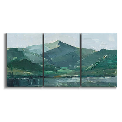 Three-panel canvas wall art featuring muted mountain range in grey tones on white background.