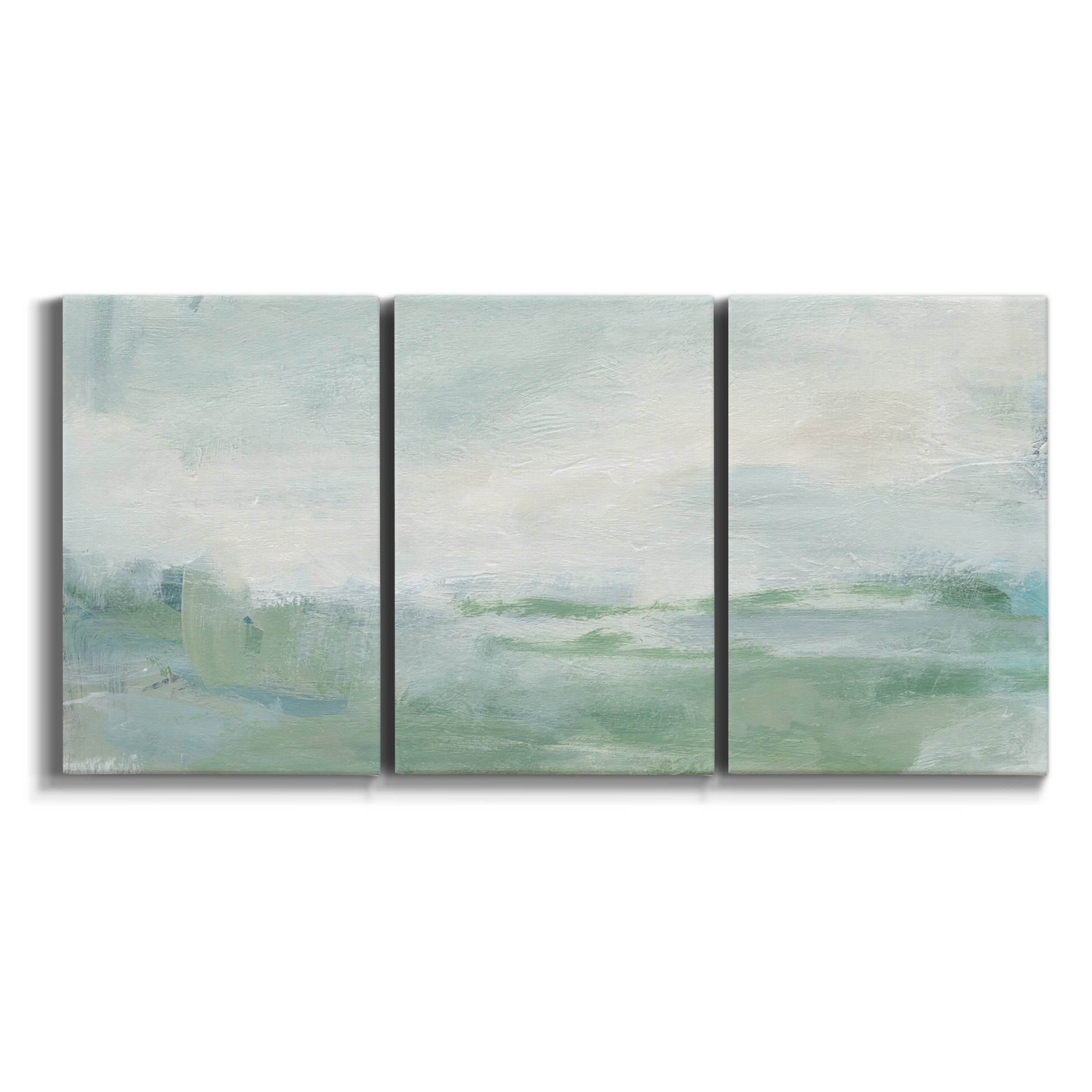 Three-panel canvas wall art featuring soft abstract coastal tones on white background.