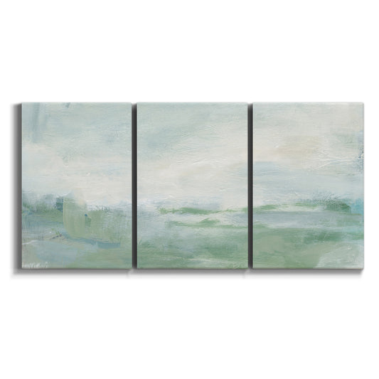 Three-panel canvas wall art featuring soft abstract coastal tones on white background.