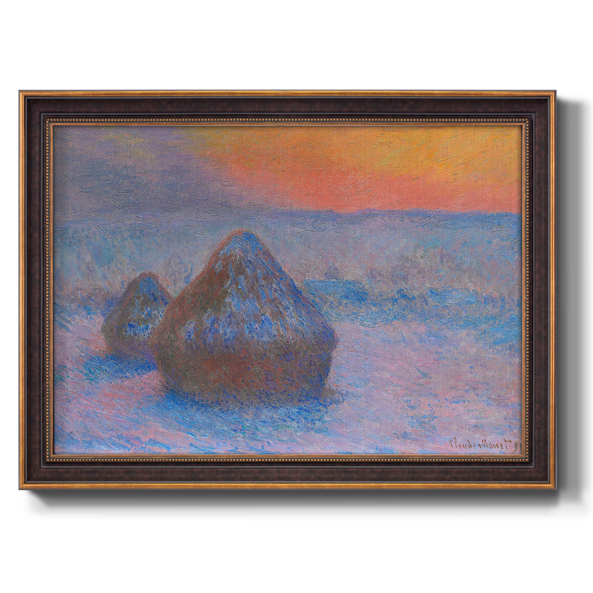 Impressionist haystack scene at sunset by Claude Monet printed on canvas in an ornate bronzed mahogany wood frame.