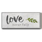 Love Never Fails - Floater Framed Canvas Print