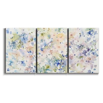 Three-panel canvas wall art featuring flowing abstract watercolor on white background.