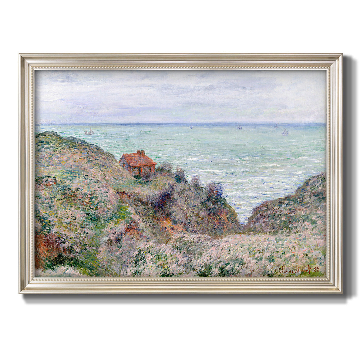 Impressionist coastal watch cabin scene by Claude Monet printed on canvas in an ornate champagne frame.