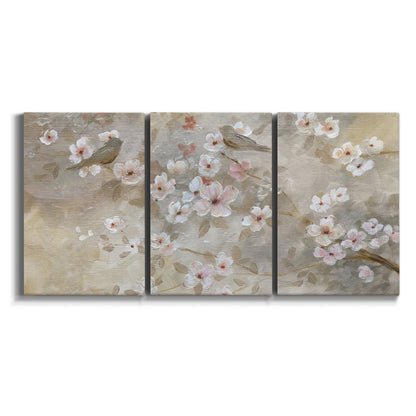 Three-panel canvas wall art featuring early spring blossoms in soft tones on white background.