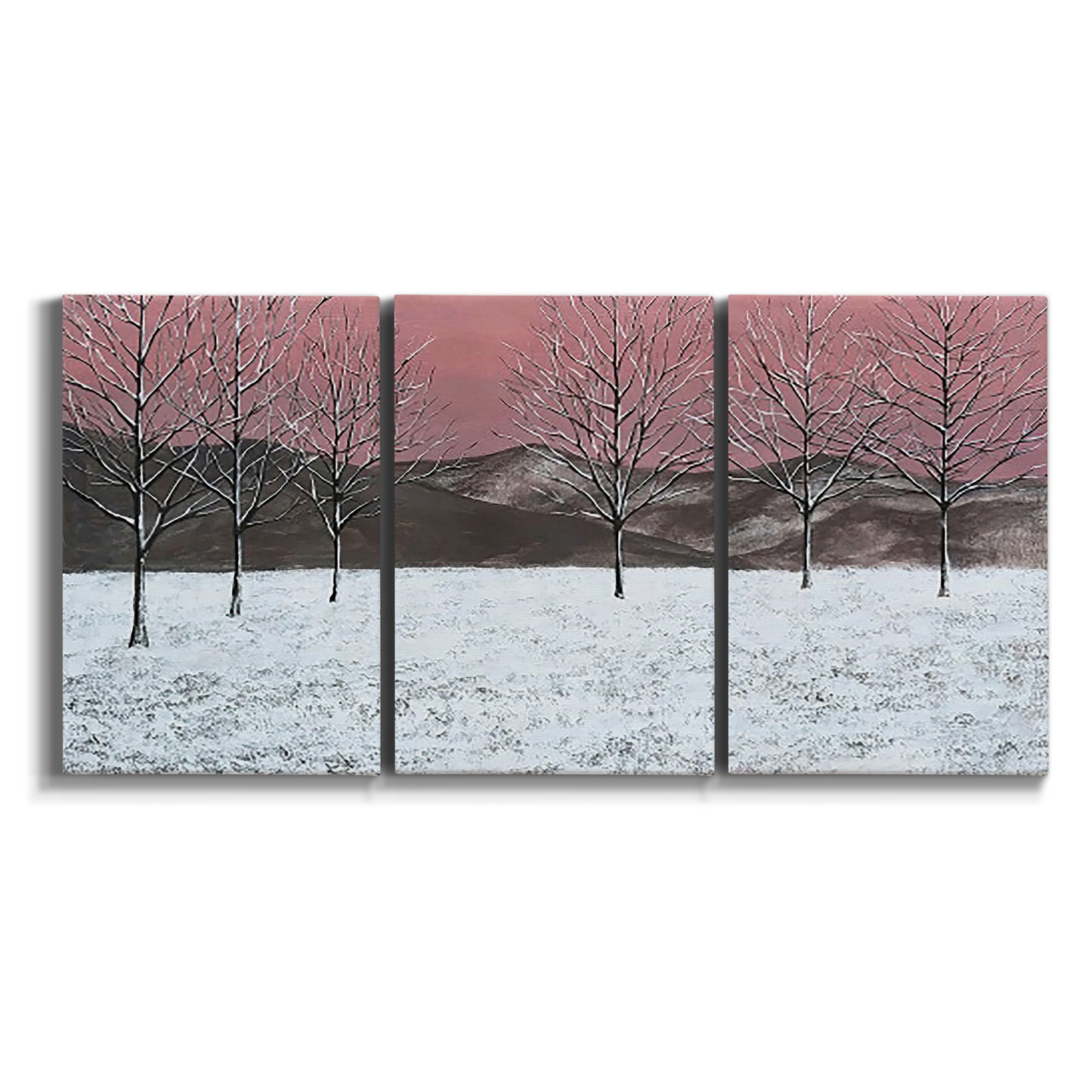 Three-panel canvas wall art featuring winter sunset snowfall landscape on white background.