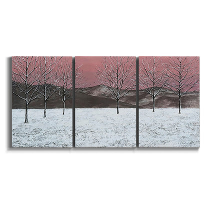 Three-panel canvas wall art featuring winter sunset snowfall landscape on white background.