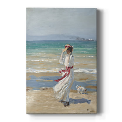 Canvas art print featuring an impressionist beach scene of a woman in flowing dress in strong wind on a clean white background.
