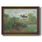 Impressionist garden landscape at Argenteuil by Claude Monet printed on canvas in an ornate bronzed mahogany wood frame.