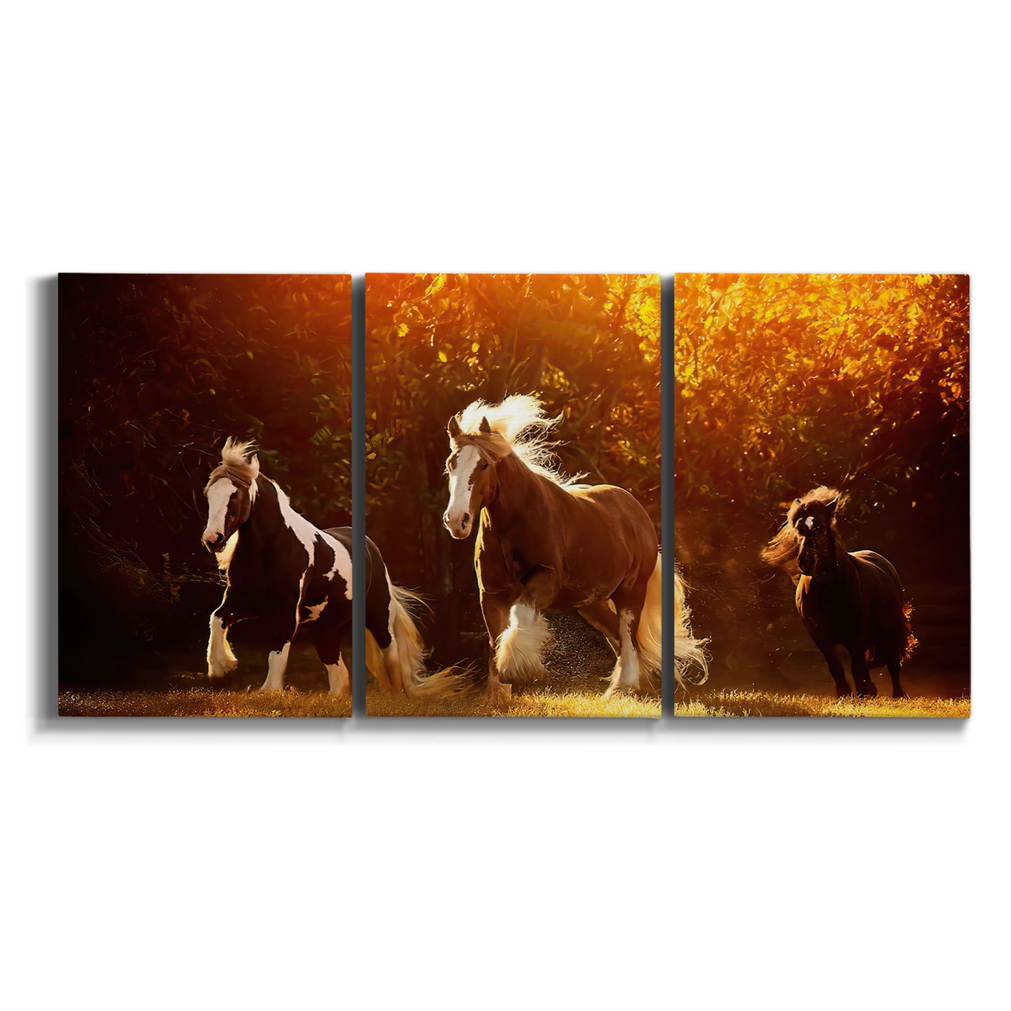 Three-panel canvas wall art featuring running horses across open field on white background.