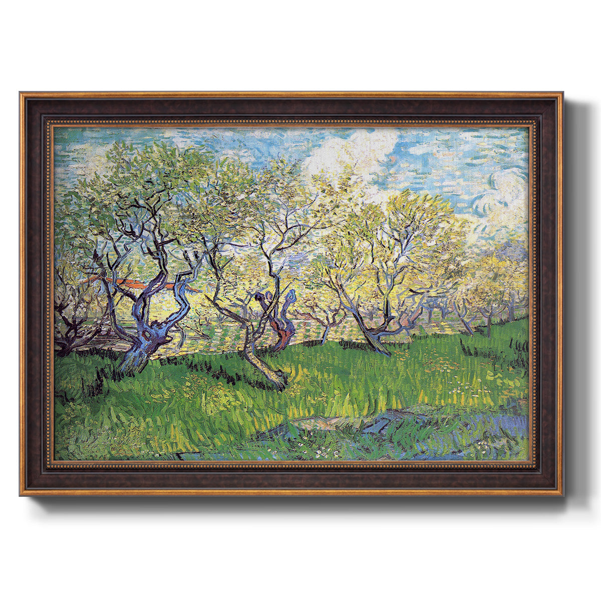 Impressionist spring orchard landscape by Vincent van Gogh printed on canvas in an ornate bronzed mahogany wood frame.