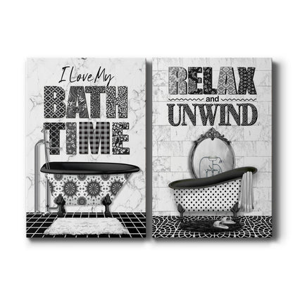 Set of two vertical canvas prints featuring vintage-style bath typography artwork in black and white, displayed side by side.