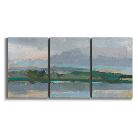 Three-panel canvas wall art featuring twilight landscape with fading light on white background.