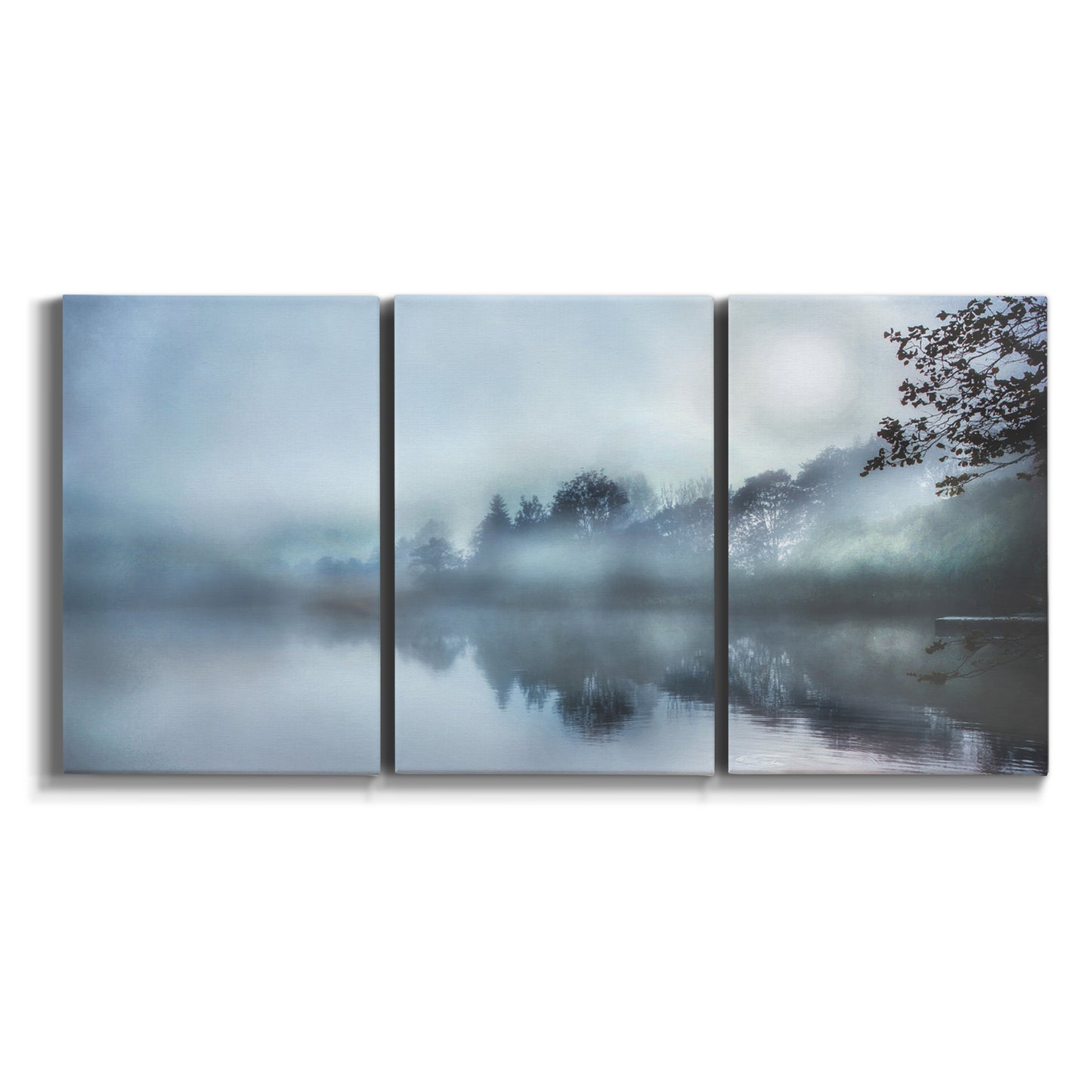 Three-panel canvas wall art featuring calm waters at sunrise photograph on white background.