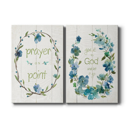 Set of two vertical canvas prints featuring inspirational faith-based botanical artwork, displayed side by side.