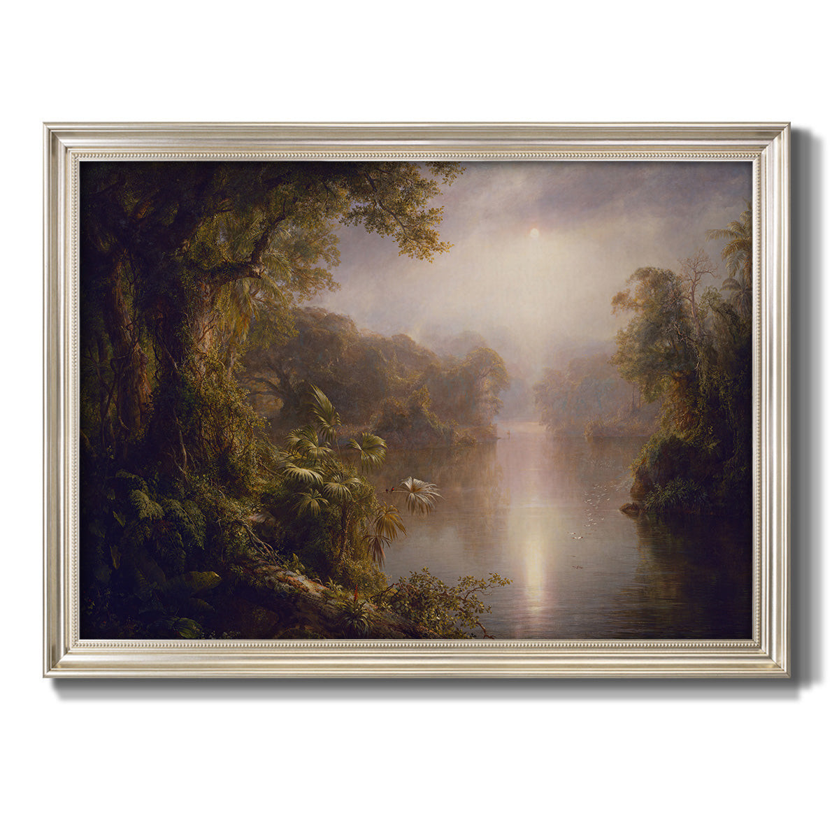 Luminous romantic landscape painting by Frederic Edwin Church printed on canvas in an ornate champagne frame.