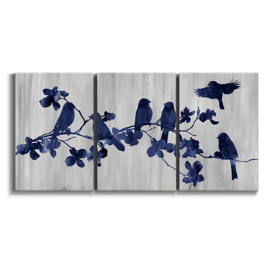 Three-panel canvas wall art featuring indigo botanical floral pattern on white background.