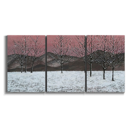 Three-panel canvas wall art featuring winter sunset snowfall landscape on white background.