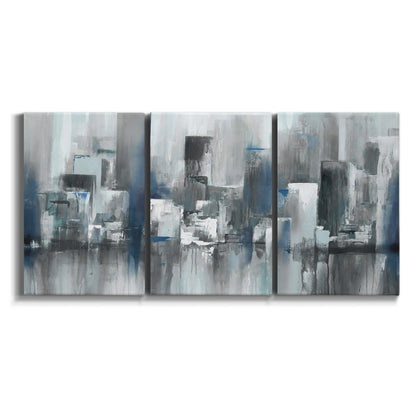 Three-panel canvas wall art featuring urban cityscape rendered in blue tones on white background.