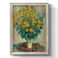 Impressionist floral painting of artichoke flowers by Claude Monet printed on canvas in an ornate champagne frame with a vertical orientation.