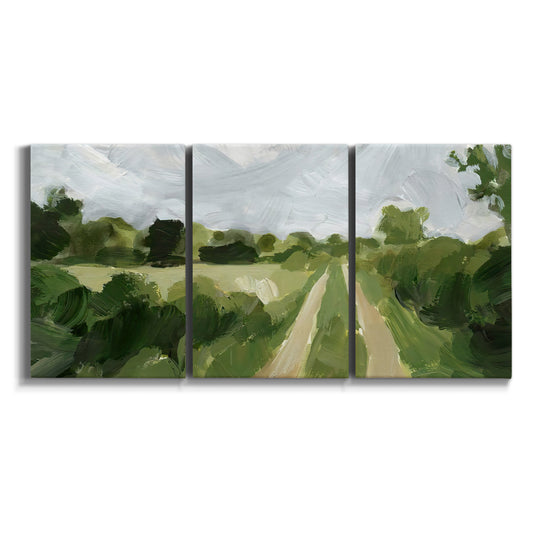 Three-panel canvas wall art featuring meadow trail through open grassland on white background.