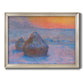 Impressionist haystack scene at sunset by Claude Monet printed on canvas in an ornate champagne frame.