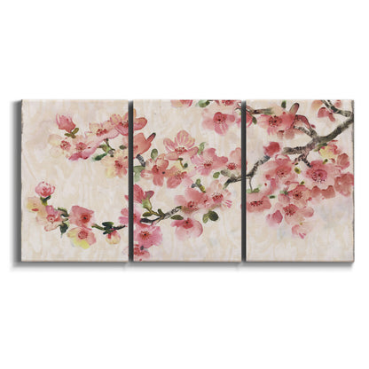 Three-panel canvas wall art featuring blooming cherry blossom branches on white background.