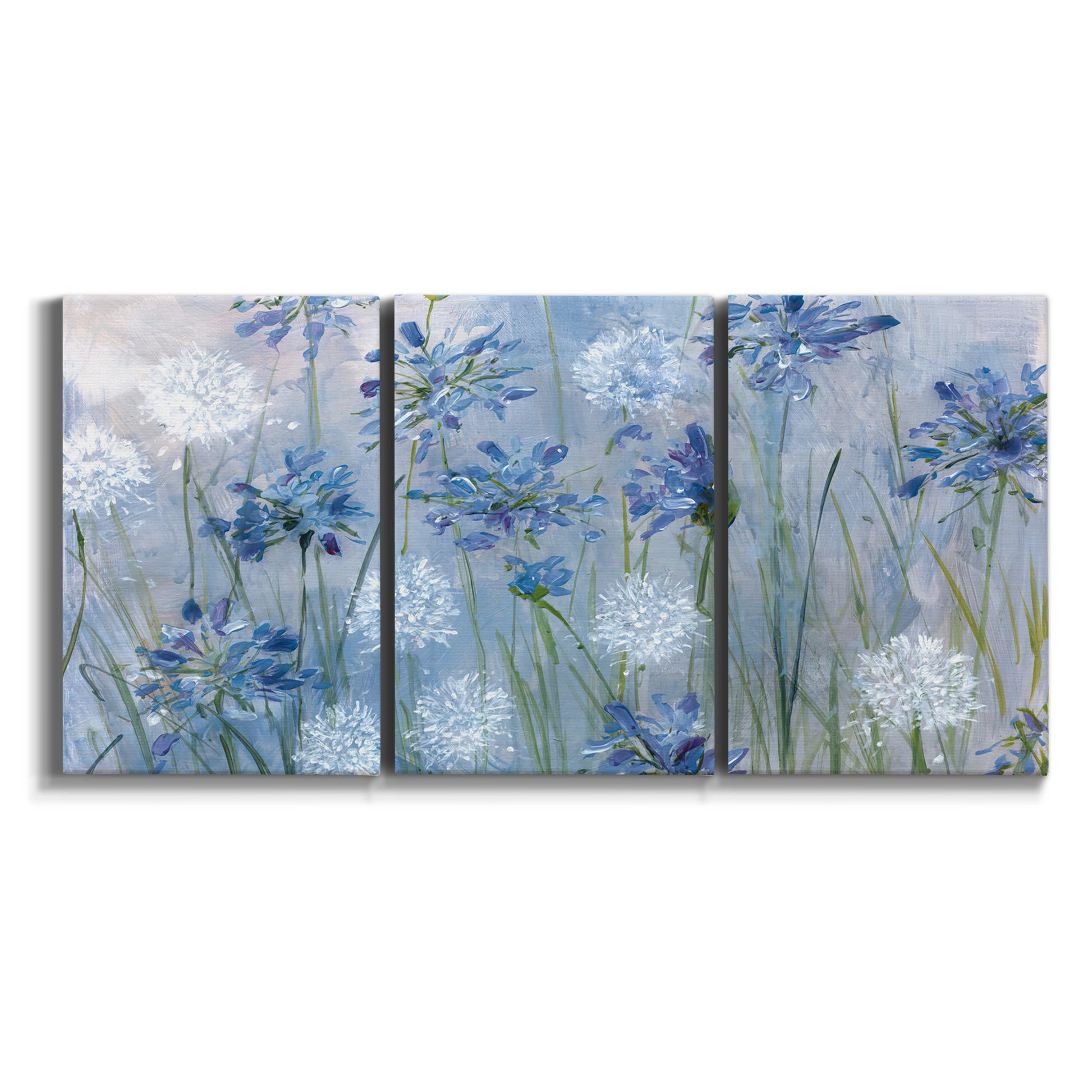 Three-panel canvas wall art featuring delicate watercolor floral blooms on white background.