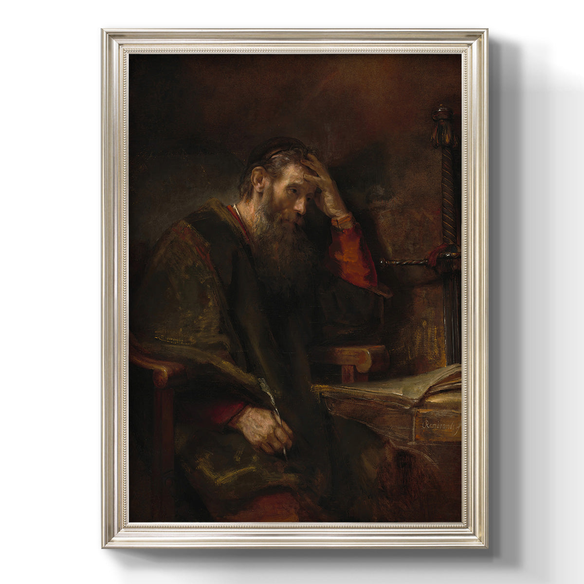 Classical religious portrait of Paul the Apostle by Rembrandt van Rijn printed on canvas in an ornate champagne frame with a vertical orientation.