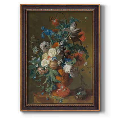 Classical floral still life with flowers in an urn by Jan van Huysum printed on canvas in an ornate weathered white frame with a vertical orientation.