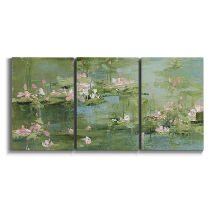 Three-panel canvas wall art featuring soft green water lilies on white background.
