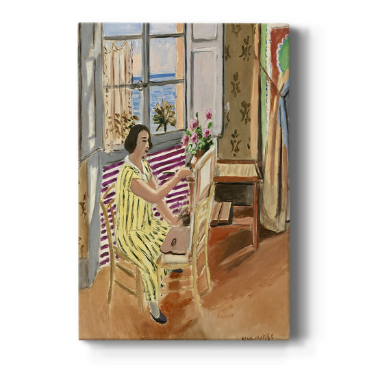 Canvas art print featuring a fauvist interior scene of an artist painting by an open window on a clean white background.
