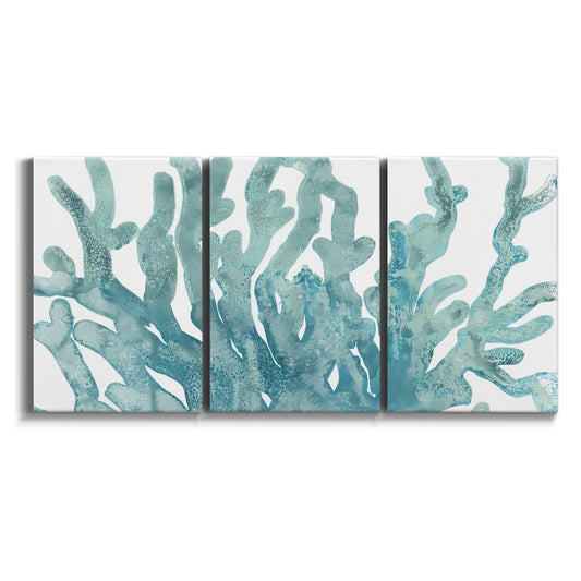 Three-panel canvas wall art featuring blue coral inspired watercolor on white background.