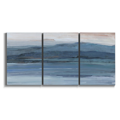 Three-panel canvas wall art featuring wide lake with distant shoreline on white background.