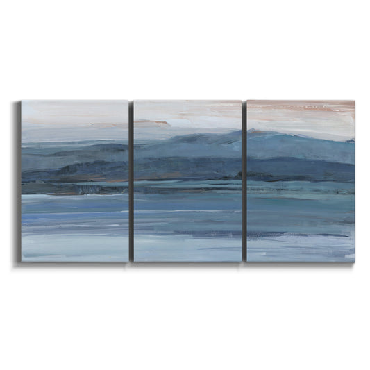 Three-panel canvas wall art featuring wide lake with distant shoreline on white background.