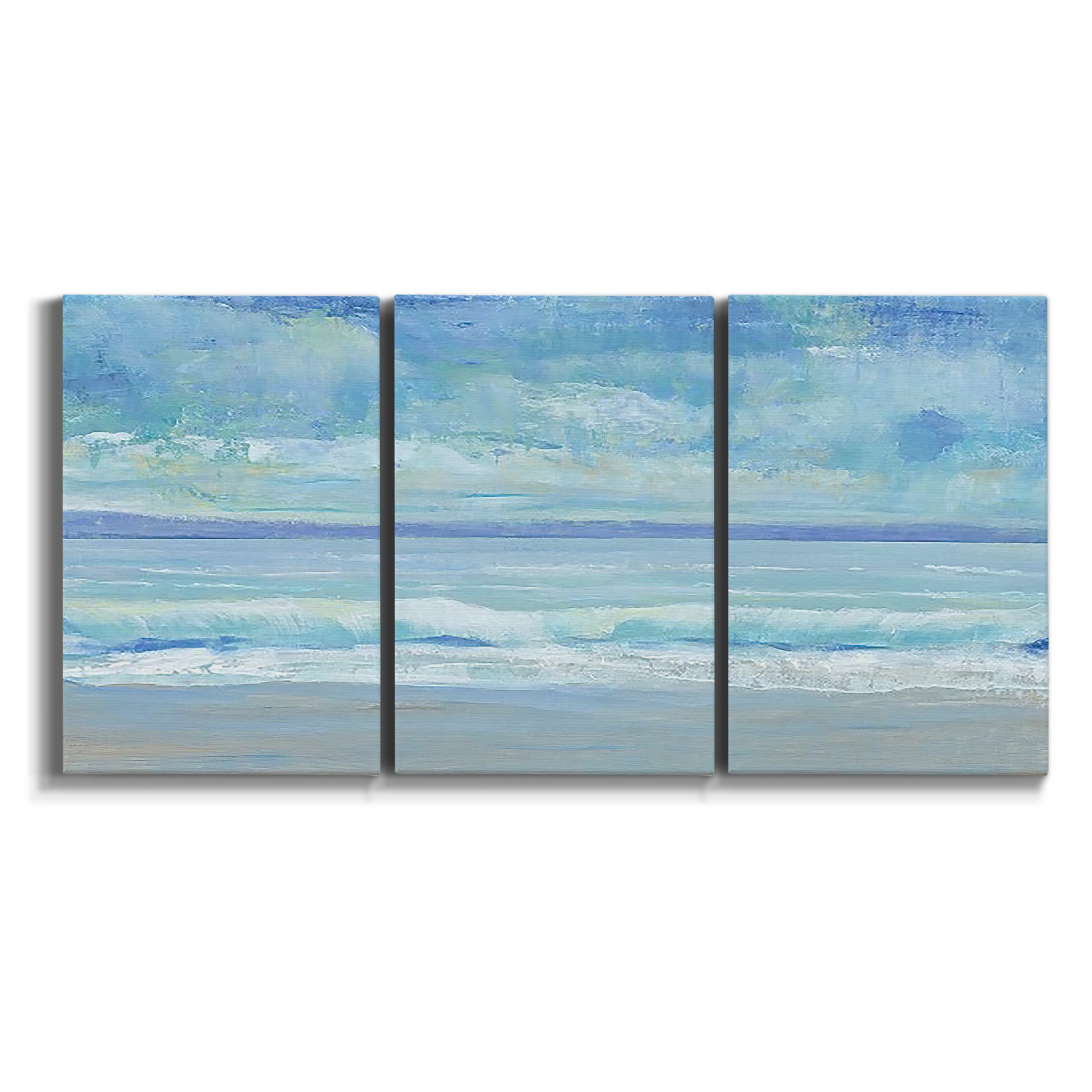 Three-panel canvas wall art featuring rolling ocean surf along shoreline on white background.