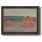 Impressionist haystack series landscape by Claude Monet printed on canvas in an ornate bronzed mahogany wood frame.